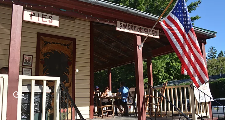 Mill front porch American flag